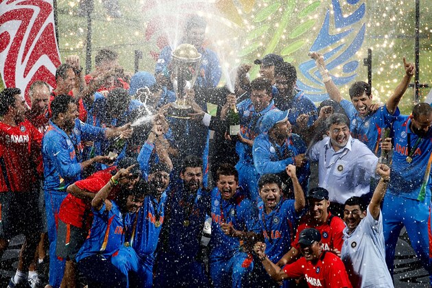 MUMBAI, INDIA - APRIL 02:  India players celebrate after India defeated Sri Lanka  in the 2011 ICC World Cup Final between India and Sri Lanka played at Wankhede Stadium on April 2, 2011 in Mumbai, India.  (Photo by Graham Crouch/Getty Images)