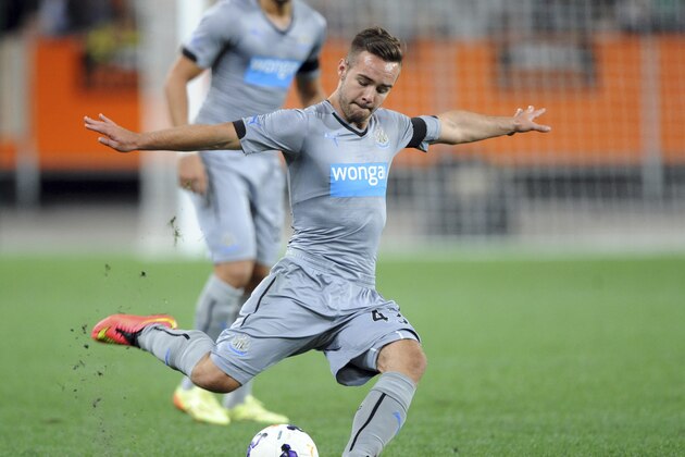 Newcastle United’s Adam Armstrong kick the ball against Sydney FC during the first match of the Football United Tour at Forsyth Barr Stadium in Dunedin, New Zealand, Tuesday, July 22, 2014. (AP Photo/SNPA, Ross Setford) NEW ZEALAND OUT