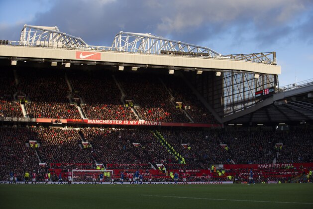 Old Trafford Stadium stands are bathed in sunshine during the English Premier League soccer match between Manchester United and Leicester at Old Trafford Stadium, Manchester, England, Saturday Jan. 31, 2015. (AP Photo/Jon Super)