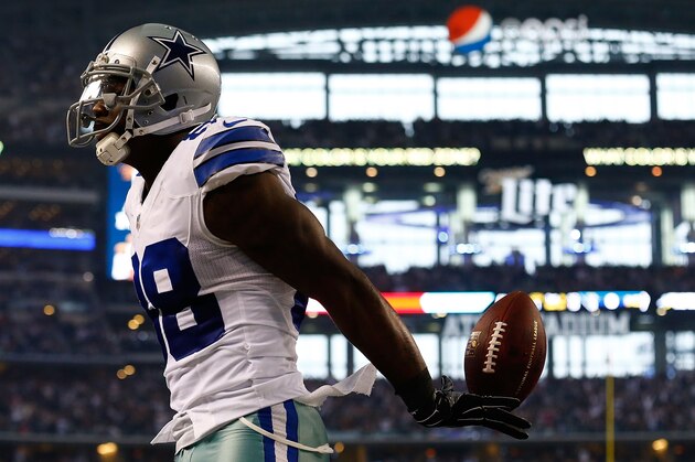 ARLINGTON, TX - DECEMBER 21:  Dez Bryant #88 of the Dallas Cowboys celebrates his touchdown reception against the Indianapolis Colts in the first half at AT&T Stadium on December 21, 2014 in Arlington, Texas.  (Photo by Tom Pennington/Getty Images)