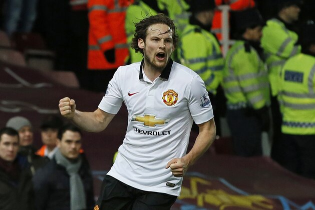 Manchester United’s Daley Blind celebrates after scoring during the English Premier League soccer match between West Ham United and Manchester United at the Boleyn Ground in London, Sunday, Feb. 8, 2015. (AP Photo/Alastair Grant)