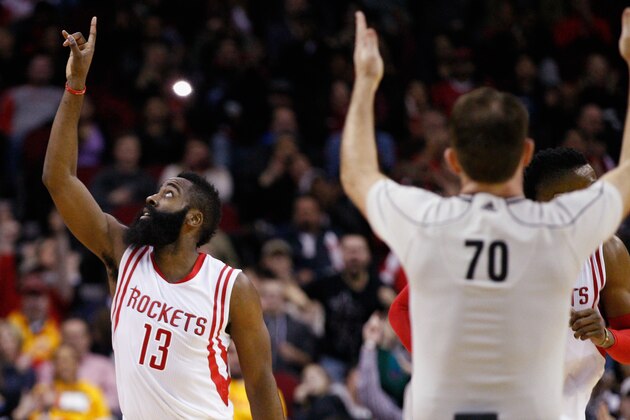 Houston Rockets guard James Harden (13) signals after making a three point shot against the Utah Jazz during the second half of an NBA basketball game Saturday, Jan. 10, 2015, in Houston. Houston won 97-82. (AP Photo/Bob Levey)
