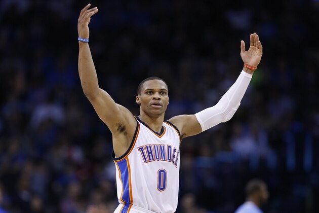 OKLAHOMA CITY, OK - FEBRUARY 8: Russell Westbrook #0 of the Oklahoma City Thunder celebrates during the game against the Los Angeles Clippers at Chesapeake Energy Arena on February 8, 2015 in Oklahoma City, Oklahoma. The Thunder defeated the Clippers 131-108. NOTE TO USER: User expressly acknowledges and agrees that, by downloading and/or using this Photograph, user is consenting to the terms and conditions of the Getty Images License Agreement. (Photo by Joe Robbins/Getty Images)