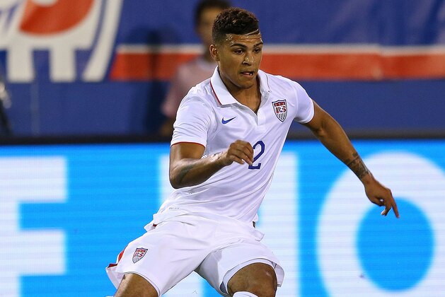 BOCA RATON, FL - OCTOBER 14:  DeAndre Yedlin #2 of the USA brings the ball upfield during a game against Honduras at FAU Stadium on October 14, 2014 in Boca Raton, Florida.  (Photo by Mike Ehrmann/Getty Images)