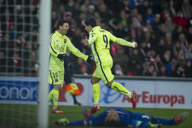 BILBAO, SPAIN - FEBRUARY 08:  Luis Suarez of FC Barcelona celebrates with his teammate Lionel Messi of FC Barcelona after scoring his goal during the La Liga match between Athletic Club and FC Barcelona at San Mames Stadium on February 8, 2015 in Bilbao, Spain.  (Photo by Juan Manuel Serrano Arce/Getty Images)