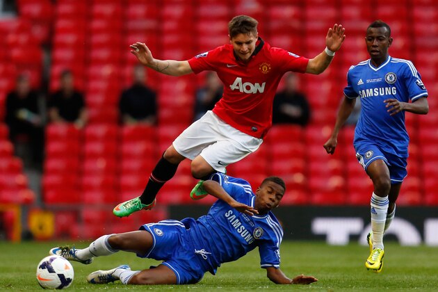 MANCHESTER, ENGLAND - MAY 14: Guillermo Varela (L) of Manchester United in action with Charly Musonda of Chelsea during the Barclays Under-21 Premier League Final match between Manchester United and Chelsea at Old Trafford on May 14, 2014 in Manchester, England. (Photo by Paul Thomas/Getty Images)