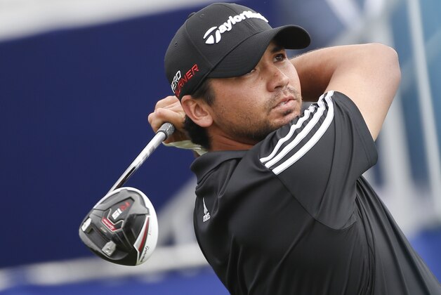 Jason Day, from Australia, watches his tee shot on the seventh hole of the south course at Torrey Pines during the final round of the Farmers Insurance Open golf tournament Sunday, Feb. 8, 2015, in San Diego. (AP Photo/Lenny Ignelzi)