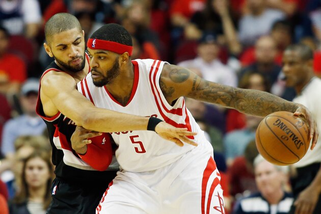 HOUSTON, TX - FEBRUARY 08:  Nicolas Batum #88 of the Portland Trail Blazers defends against Josh Smith #5 of the Houston Rockets during their game at the Toyota Center on February 8, 2015 in Houston, Texas. NOTE TO USER: User expressly acknowledges and agrees that, by downloading and/or using this photograph, user is consenting to the terms and conditions of the Getty Images License Agreement.  (Photo by Scott Halleran/Getty Images)