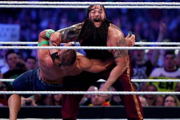 John Cena, left, and Bray Wyatt, right, compete during Wrestlemania XXX at the Mercedes-Benz Super Dome in New Orleans on Sunday, April 6, 2014. (Jonathan Bachman/AP Images for WWE)