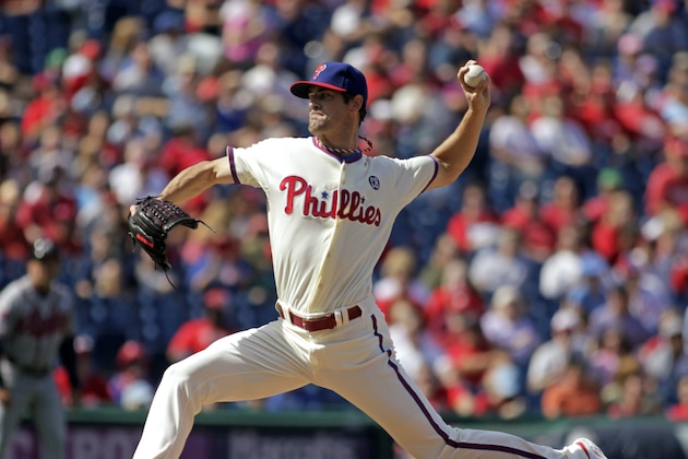 Philadelphia Phillies starting pitcher Cole Hamels throws against the Atlanta Braves in the first inning of a baseball game Sunday, Sept. 28, 2014, in Philadelphia. (AP Photo/H. Rumph Jr)