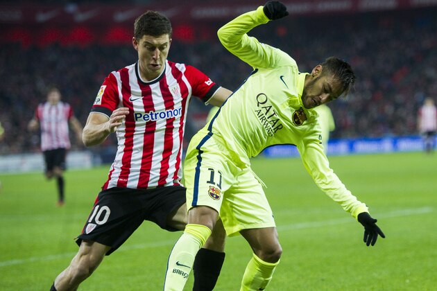 BILBAO, SPAIN - FEBRUARY 08:  Neymar of FC Barcelona duels for the ball with Oscar De Marcos of Athletic Club during the La Liga match between Athletic Club and FC Barcelona at San Mames Stadium on February 8, 2015 in Bilbao, Spain.  (Photo by Juan Manuel Serrano Arce/Getty Images)