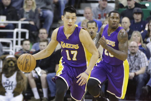 Los Angeles Lakers guard Jeremy Lin (17) brings the ball up court in the second quarter during an NBA basketball game against the Utah Jazz Friday, Jan. 16, 2015, in Salt Lake City. (AP Photo/Rick Bowmer)