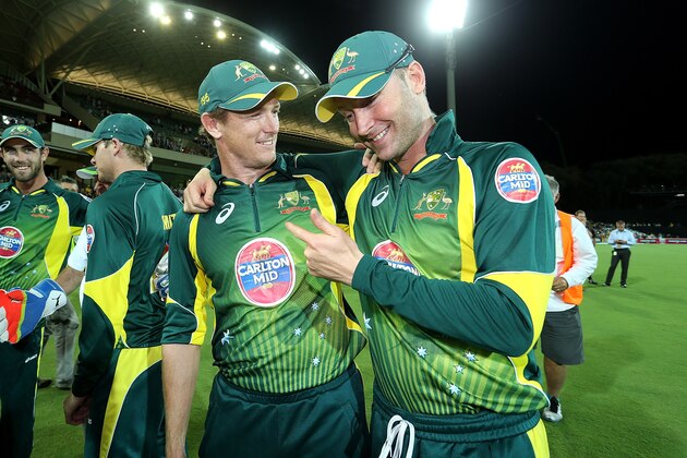 ADELAIDE, AUSTRALIA - JANUARY 26: (L) George Bailey celebrates with Michael Clarke of Australia after game five of the One Day International Series between Australia and England at Adelaide Oval on January 26, 2014 in Adelaide, Australia.  (Photo by Daniel Kalisz/Getty Images)