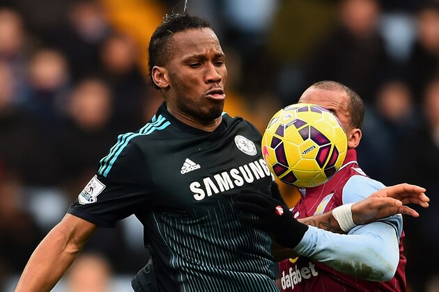 BIRMINGHAM, ENGLAND - FEBRUARY 07:  Didier Drogba of Chelsea battles for the ball with Gabriel Agbonlahor of Aston Villa during the Barclays Premier League match between Aston Villa and Chelsea at Villa Park on February 7, 2015 in Birmingham, England.  (Photo by Laurence Griffiths/Getty Images)