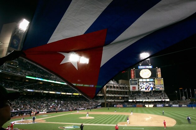 SAN DIEGO - MARCH 20:  A fan waves a Cuban flag during action at the Final game of the World Baseball Classic between Team Cuba and Team Japan at Petco Park on March 20, 2006 in San Diego, California.  (Photo by Donald Miralle/Getty Images)