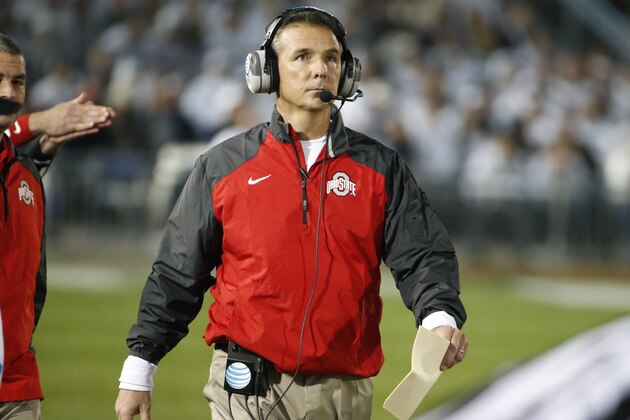 Ohio State head coach Urban Meyer walks the sideline during the second quarter an NCAA college football game against Penn State in State College, Pa., Saturday, Oct. 25, 2014. (AP Photo/Gene J. Puskar)