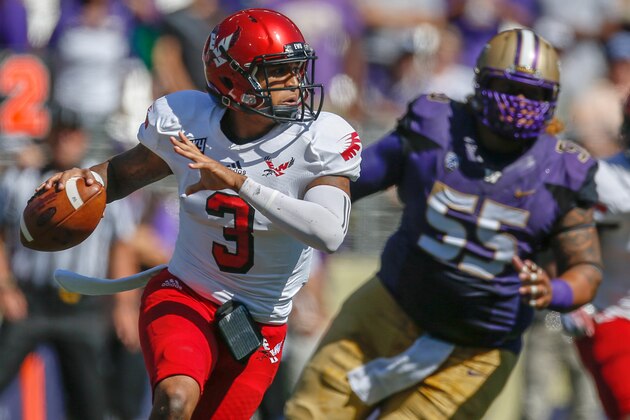 SEATTLE, WA - SEPTEMBER 06:  Quarterback Vernon Adams Jr. #3 of the Eastern Washington Eagles rushes against the Washington Huskies on September 6, 2014 at Husky Stadium in Seattle, Washington.  (Photo by Otto Greule Jr/Getty Images)