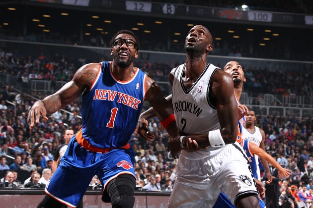 NEW YORK, NY - DECEMBER 5: Amar'e Stoudemire #1 of the New York Knicks and Kevin Garnett #2 of the Brooklyn Nets box out during a game at Barclays Center on December 5, 2013 in the Brooklyn borough of New York City.  NOTE TO USER: User expressly acknowledges and agrees that, by downloading and/or using this Photograph, user is consenting to the terms and conditions of the Getty Images License Agreement. Mandatory Copyright Notice: Copyright 2013 NBAE (Photo by Nathaniel S. Butler/NBAE via Getty Images)