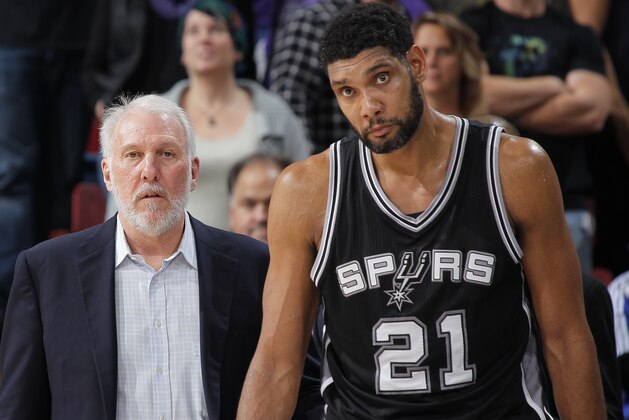 SACRAMENTO, CA - NOVEMBER 15: Head Coach Gregg Popovich of the San Antonio Spurs coaches his player Tim Duncan #21 against the Sacramento Kings on November 15, 2014 at Sleep Train Arena in Sacramento, California. NOTE TO USER: User expressly acknowledges and agrees that, by downloading and or using this photograph, User is consenting to the terms and conditions of the Getty Images Agreement. Mandatory Copyright Notice: Copyright 2014 NBAE (Photo by Rocky Widner/NBAE via Getty Images)
