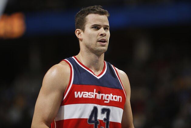 Washington Wizards forward Kris Humphries looks on against the Denver Nuggets in the first quarter of an NBA basketball game Sunday, Jan. 25, 2015, in Denver. (AP Photo/David Zalubowski)
