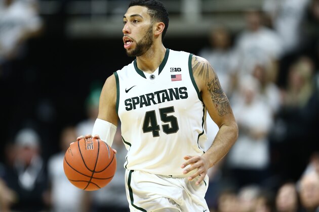 EAST LANSING, MI - NOVEMBER 21:  Denzel Valentine #45 of the Michigan State Spartans brings the ball up court against the Loyola-Chicago Ramblers at the Breslin Center on November 21, 2014 in East Lansing, Michigan. Michigan State defeated Loyola-Chicago 87 - 52. (Photo by Rey Del Rio/Getty Images)
