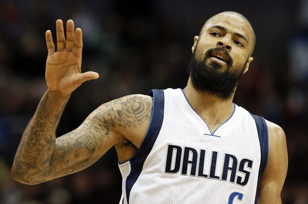 Dallas Mavericks center Tyson Chandler (6) runs up court after sinking a basket during an NBA basketball game against the Minnesota Timberwolves, Monday, Feb. 2, 2015, in Dallas. (AP Photo/Tony Gutierrez)