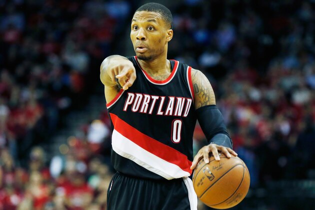 HOUSTON, TX - FEBRUARY 08:  Damian Lillard #0 of the Portland Trail Blazers looks to pass on the court during their game against the Houston Rockets at the Toyota Center on February 8, 2015 in Houston, Texas. NOTE TO USER: User expressly acknowledges and agrees that, by downloading and/or using this photograph, user is consenting to the terms and conditions of the Getty Images License Agreement.  (Photo by Scott Halleran/Getty Images)