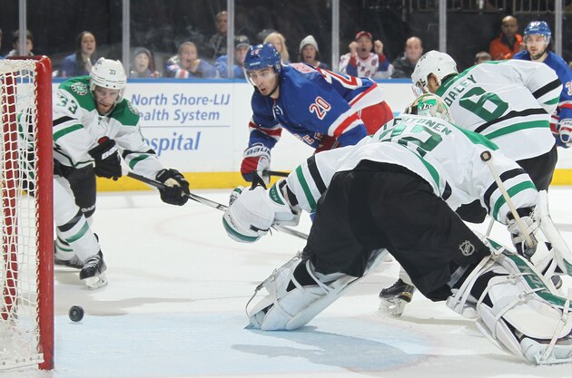 NEW YORK, NY - FEBRUARY 08:  Chris Kreider #20 of the New York Rangers watches as the puck rolls past Kari Lehtonen #32 of the Dallas Stars and into the net for a goal in the third period at Madison Square Garden on February 8, 2015 in New York City. (Photo by Jared Silber/NHLI via Getty Images)