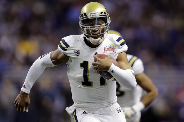 UCLA’s Brett Hundley (17) rushes for a touchdown against Kansas State during the first half of the Alamo Bowl NCAA college football game, Friday, Jan. 2, 2015, in San Antonio. (AP Photo/Eric Gay)