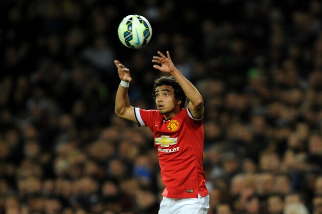 Manchester United's Rafael during the English Premier League soccer match between West Bromwich Albion and Manchester United at the Hawthorns, Birmingham, England, Monday, Oct. 20, 2014. (AP Photo/Rui Vieira)