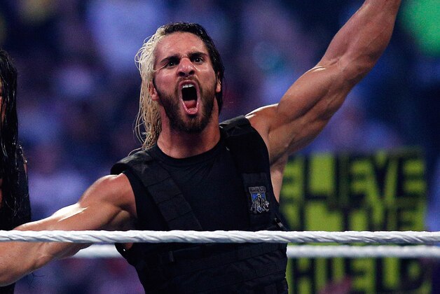 The Shield reacts after their win during Wrestlemania XXX at the Mercedes-Benz Super Dome in New Orleans on Sunday, April 6, 2014. (Jonathan Bachman/AP Images for WWE)