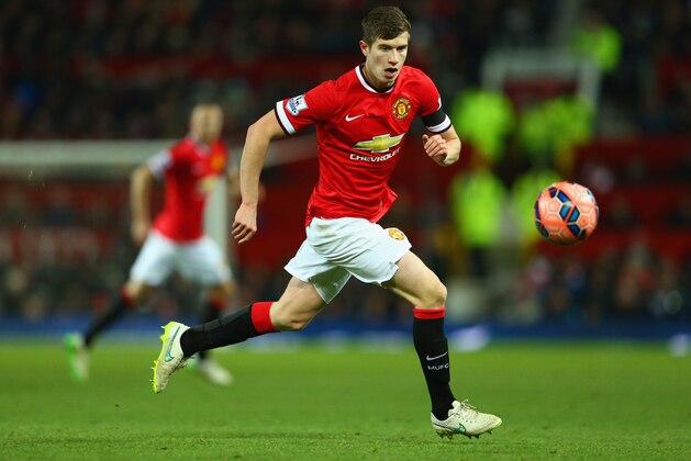 MANCHESTER, ENGLAND - FEBRUARY 03: Paddy McNair of Manchester United on the ball during the FA Cup Fourth round replay match between Manchester United and Cambridge United at Old Trafford on February 3, 2015 in Manchester, England.  (Photo by Clive Mason/Getty Images)