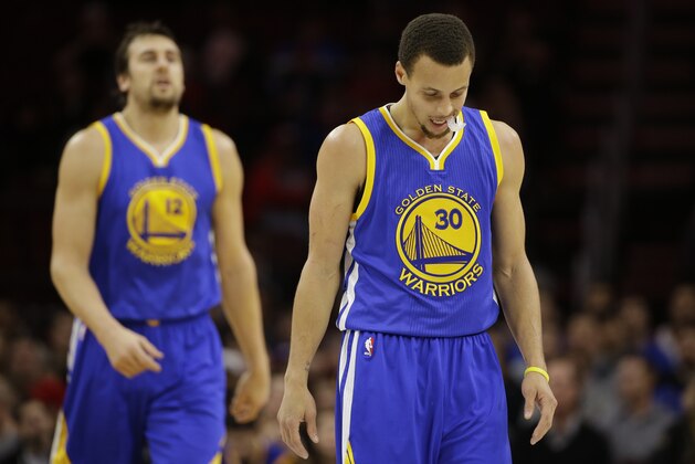 Golden State Warriors' Stephen Curry in action during an NBA basketball game against the Philadelphia 76ers, Monday, Feb. 9, 2015, in Philadelphia. (AP Photo/Matt Slocum)