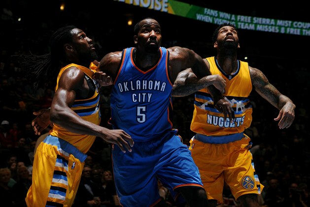 DENVER, CO - FEBRUARY 9: Kendrick Perkins #5 of the Oklahoma City Thunder battles for position against Kenneth Faried #35 and Wilson Chandler #21 of the Denver Nuggets on February 9, 2015 at the Pepsi Center in Denver, Colorado. NOTE TO USER: User expressly acknowledges and agrees that, by downloading and/or using this Photograph, user is consenting to the terms and conditions of the Getty Images License Agreement. Mandatory Copyright Notice: Copyright 2015 NBAE (Photo by Bart Young/NBAE via Getty Images)