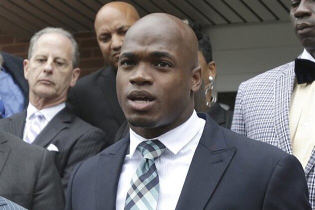 FILE - In this Nov. 4, 2014, file photo, Minnesota Vikings running back Adrian Peterson speaks to the media after pleading no contest to an assault charge in Conroe, Texas. The NFL suspended Adrian Peterson without pay for at least the remainder of the season. The league said Tuesday, Nov. 18, 2014, it informed the Minnesota Vikings running back he will not be considered for reinstatement before April 15 for violating the NFL personal conduct policy.  (AP Photo/Pat Sullivan, File)