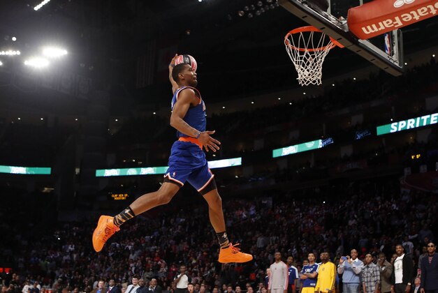 Feb 16, 2013; Houston, TX, USA; New York Knicks guard James White attempts a dunk during the 2013 NBA all star slam dunk contest at the Toyota Center. Mandatory Credit: Brett Davis-USA TODAY Sports