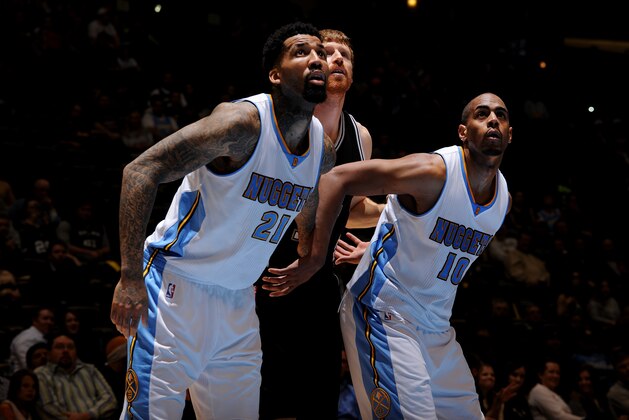 DENVER, CO - January 20: Wilson Chandler #21 and Arron Afflalo #10 of the Denver Nuggets battle for position against  Matt Bonner #15 of the San Antonio Spurs on January 20, 2015 at the Pepsi Center in Denver, Colorado. NOTE TO USER: User expressly acknowledges and agrees that, by downloading and/or using this Photograph, user is consenting to the terms and conditions of the Getty Images License Agreement. Mandatory Copyright Notice: Copyright 2015 NBAE (Photo by Bart Young/NBAE via Getty Images)