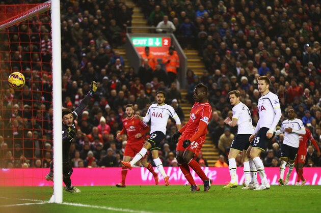 LIVERPOOL, ENGLAND - FEBRUARY 10: Mario Balotelli of Liverpool scores during the Barclays Premier League match between Liverpool and Tottenham Hotspur at Anfield on February 10, 2015 in Liverpool, England.  (Photo by Clive Brunskill/Getty Images)