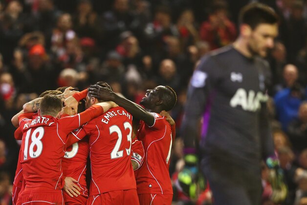 LIVERPOOL, ENGLAND - FEBRUARY 10: Liverpool players celebrate the goal scored by Mario Balotelli during the Barclays Premier League match between Liverpool and Tottenham Hotspur at Anfield on February 10, 2015 in Liverpool, England.  (Photo by Clive Brunskill/Getty Images)