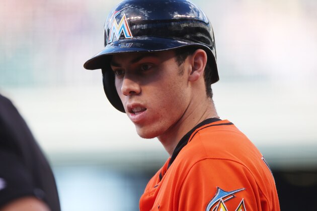 Miami Marlins' leadoff hitter Christian Yelich steps into batter's box to face the Colorado Rockies in the first inning of a baseball game in Denver on Saturday, Aug. 23, 2014.. (AP Photo/David Zalubowski)