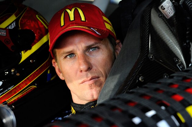 MARTINSVILLE, VA - OCTOBER 25:  Jamie McMurray, driver of the #1 McDonald's Chevrolet, sits in his car in the garage area during practice for the NASCAR Sprint Cup Series Goody's Headache Relief Shot 500 at Martinsville Speedway on October 25, 2014 in Martinsville, Virginia.  (Photo by Jared C. Tilton/Getty Images)