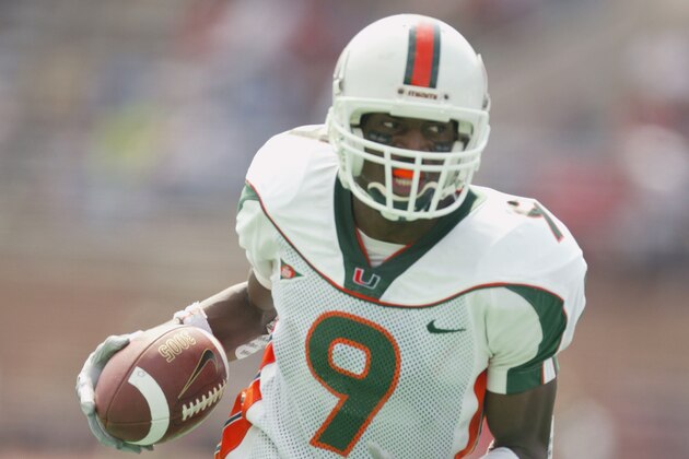 PHILADELPHIA - SEPTEMBER 14:   Kevin Beard #9 of the Miami Hurricanes runs the ball during the NCAA football game against the Temple Owls at Franklin Field in Philadelphia, Pennsylvania on September 14, 2002.  Miami defeated Temple 44-21.  (Photo by Al Bello /Getty Images)