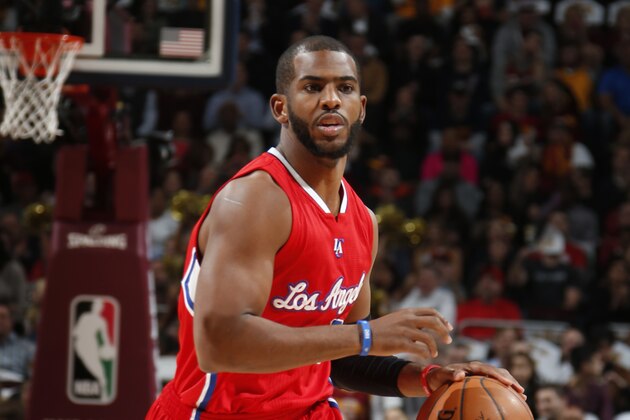 CLEVELAND, OH - FEBRUARY 5: Chris Paul #3 of the Los Angeles Clippers handles the ball against the Cleveland Cavaliers on February 5, 2015 at Quicken Loans Arena in Cleveland, Ohio. NOTE TO USER: User expressly acknowledges and agrees that, by downloading and/or using this Photograph, user is consenting to the terms and conditions of the Getty Images License Agreement. Mandatory Copyright Notice: Copyright 2015 NBAE (Photo by Gregory Shamus/NBAE via Getty Images)