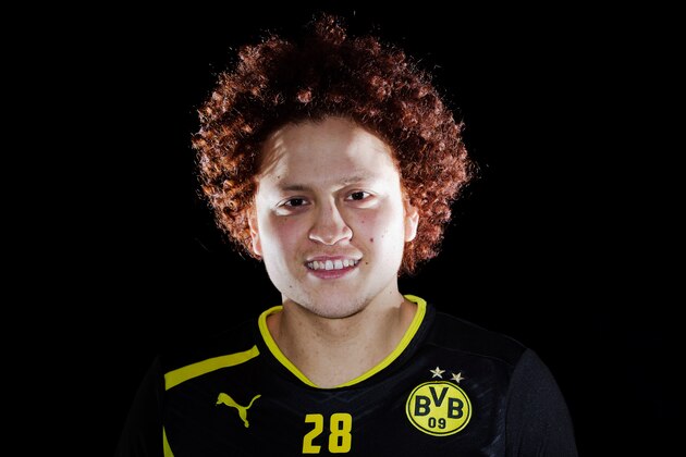DORTMUND, GERMANY - MARCH 13: (EXCLUSIVE COVERAGE)   Midfielder,  Mustafa Amini of Australia and club team Borussia Dortmund poses during a portrait session at the BVB Training Centre on March 13, 2013 in Dortmund, Germany.  (Photo by Dean Mouhtaropoulos/Getty Images)