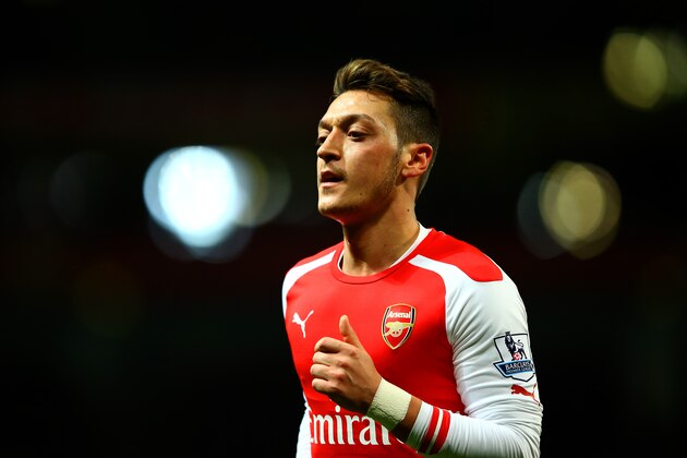 LONDON, ENGLAND - FEBRUARY 10:  Mesut Oezil of Arsenal looks on during the Barclays Premier League match between Arsenal and Leicester City at Emirates Stadium on February 10, 2015 in London, England.  (Photo by Richard Heathcote/Getty Images)