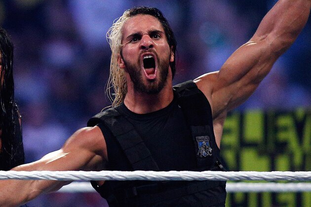 The Shield reacts after their win during Wrestlemania XXX at the Mercedes-Benz Super Dome in New Orleans on Sunday, April 6, 2014. (Jonathan Bachman/AP Images for WWE)