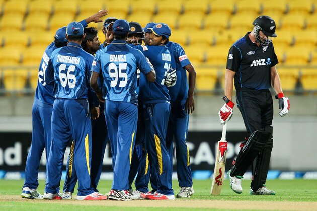 WELLINGTON, NEW ZEALAND - JANUARY 29:  Sri Lanka celebrate as Kyle Mills of New Zealand leaves the field after being dismissed during the One Day International match between New Zealand and Sri Lanka at Westpac Stadium on January 29, 2015 in Wellington, New Zealand.  (Photo by Hagen Hopkins/Getty Images)