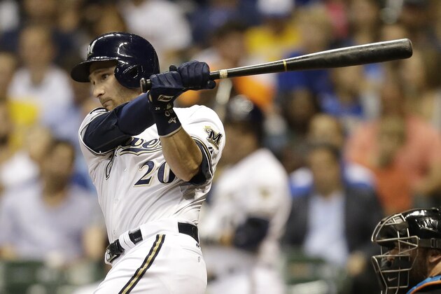 MILWAUKEE, WI - SEPTEMBER 09: Jonathan Lucroy #20 of the Milwaukee Brewers hits a single in the bottom of the third inning against the Miami Marlins against the Milwaukee Brewers at Miller Park on September 09, 2014 in Milwaukee, Wisconsin. (Photo by Mike McGinnis/Getty Images)