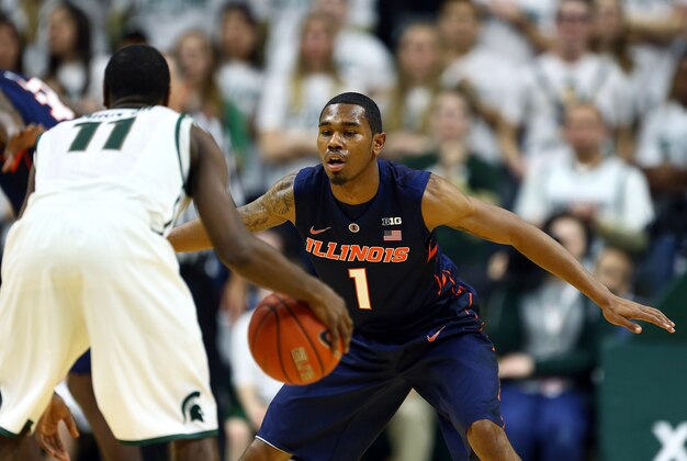 Feb 7, 2015; East Lansing, MI, USA;  Illinois Fighting Illini guard Jaylon Tate (1) defends Michigan State Spartans guard Lourawls Nairn Jr. (11) during the first half of a game at Jack Breslin Student Events Center. Mandatory Credit: Mike Carter-USA TODAY Sports