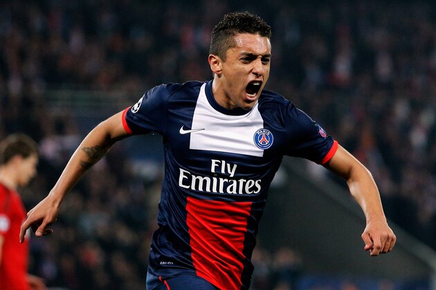 PARIS, FRANCE - MARCH 12:  Marquinhos #5 of Paris Saint-Germain celebrates after he scores their first goal during the UEFA Champions League Round of 16 second leg match between Paris Saint-Germain FC and Bayer Leverkusen at Parc des Princes on March 12, 2014 in Paris, France.  (Photo by Dean Mouhtaropoulos/Getty Images)